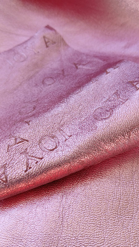 Trying out logos on pink leather JOY-A